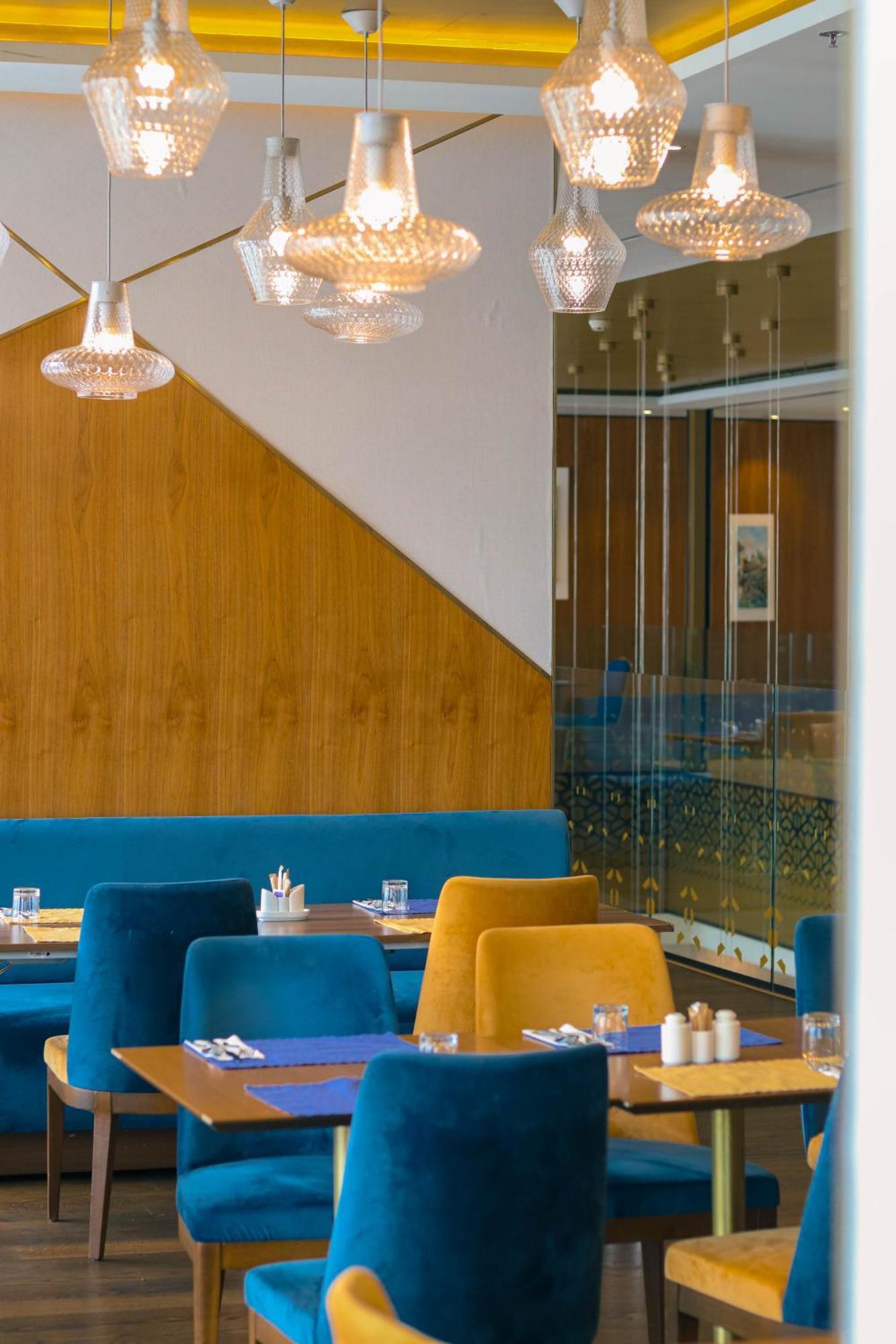 Swissotel SJJ Eksteriør bilde Restaurant